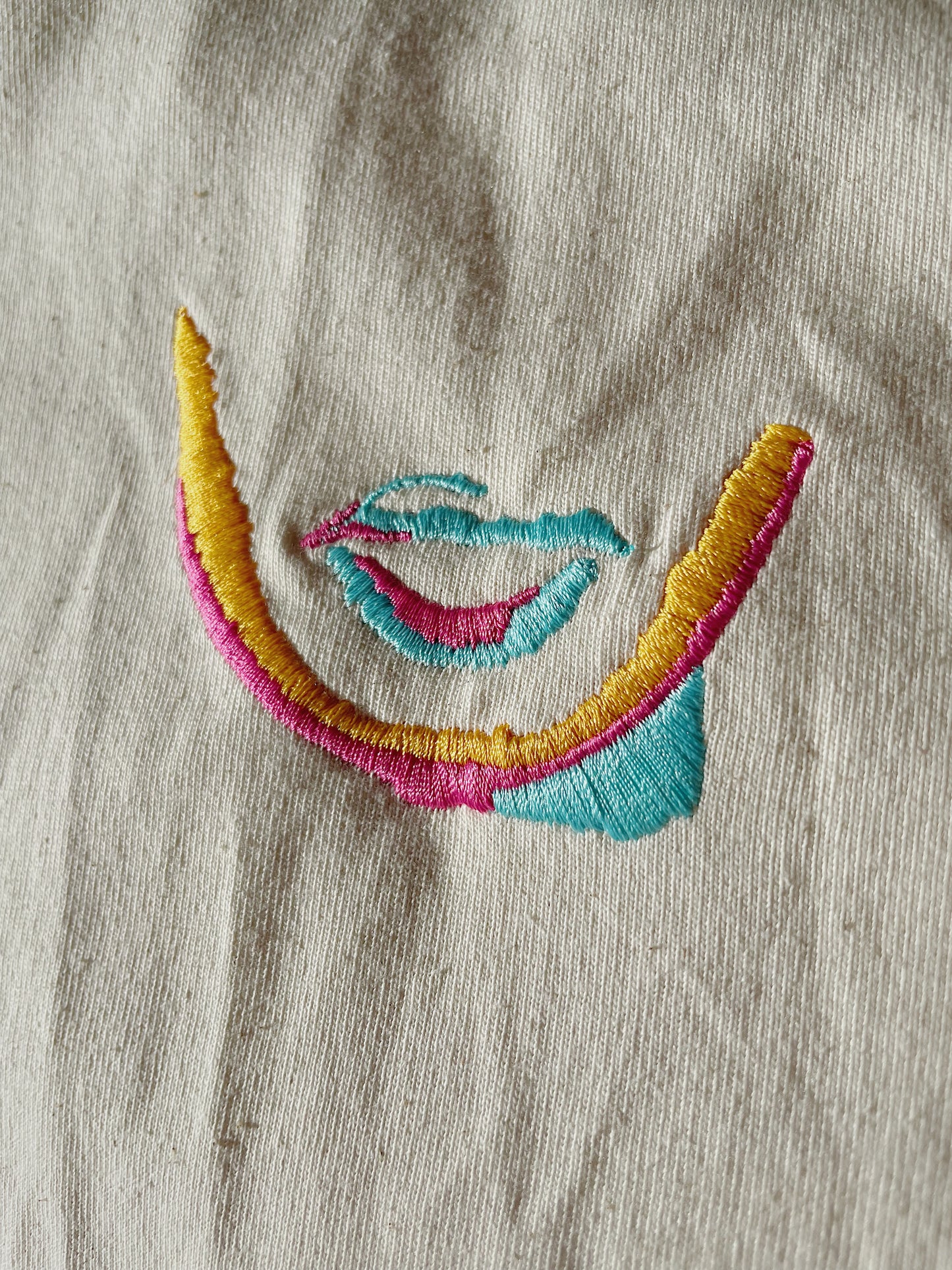 
                  
                    Embroidered Queen's Face
                  
                